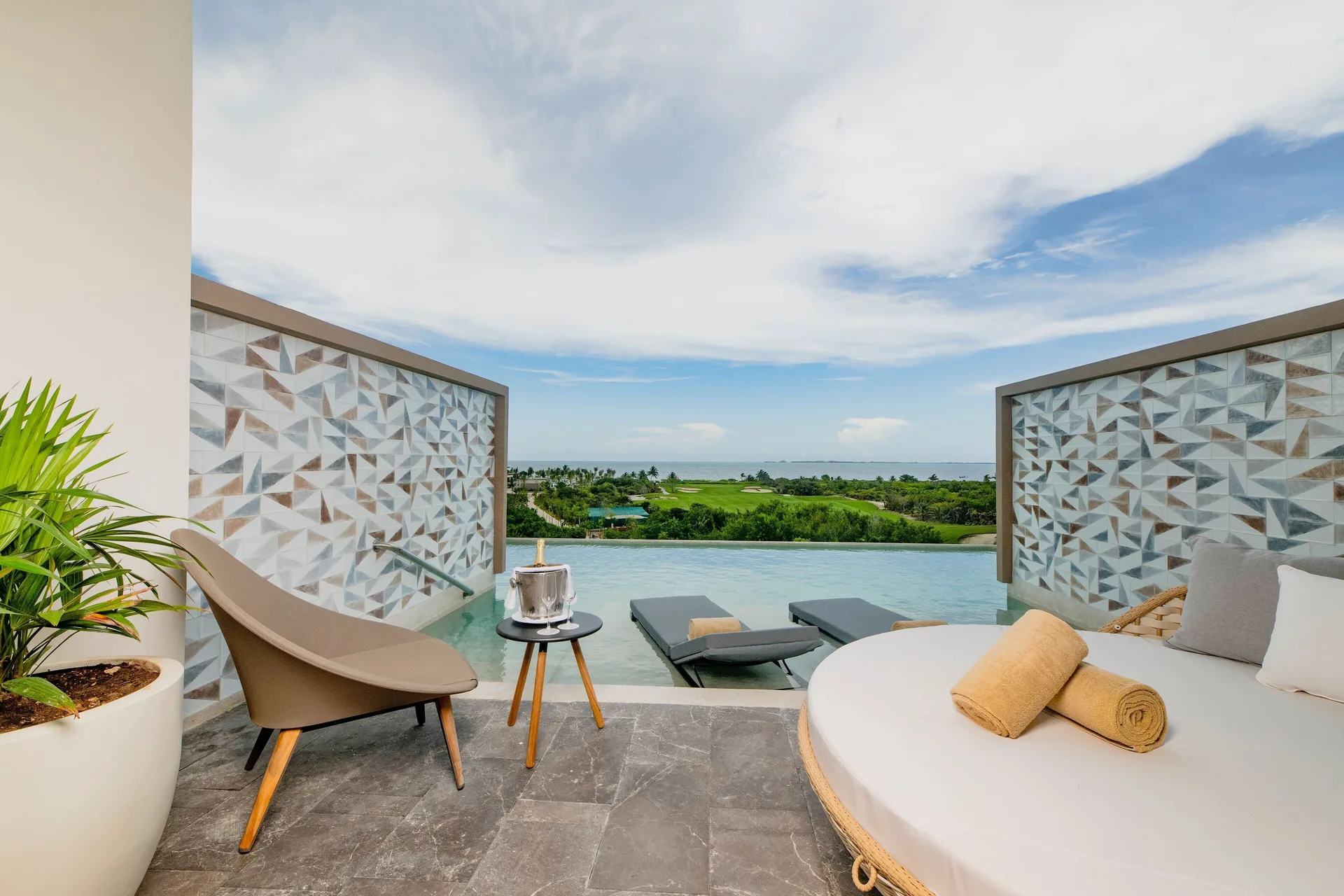 Inspira Junior Suite Swim Out Ocean View terrace and plunge pool at Atelier Playa Mujeres.