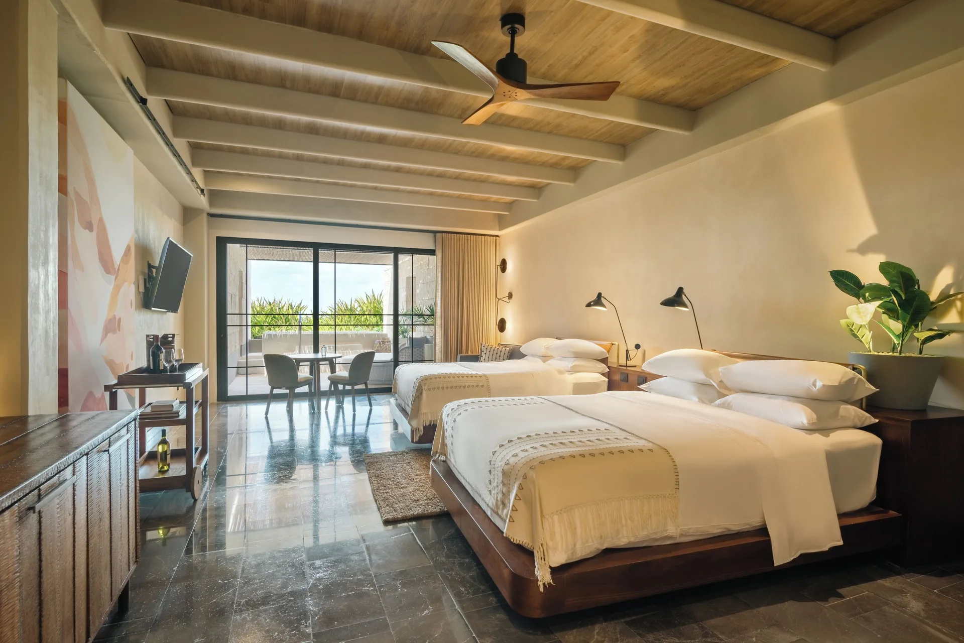Inspira Terrace Suite with two beds and balcony at Atelier Playa Mujeres.