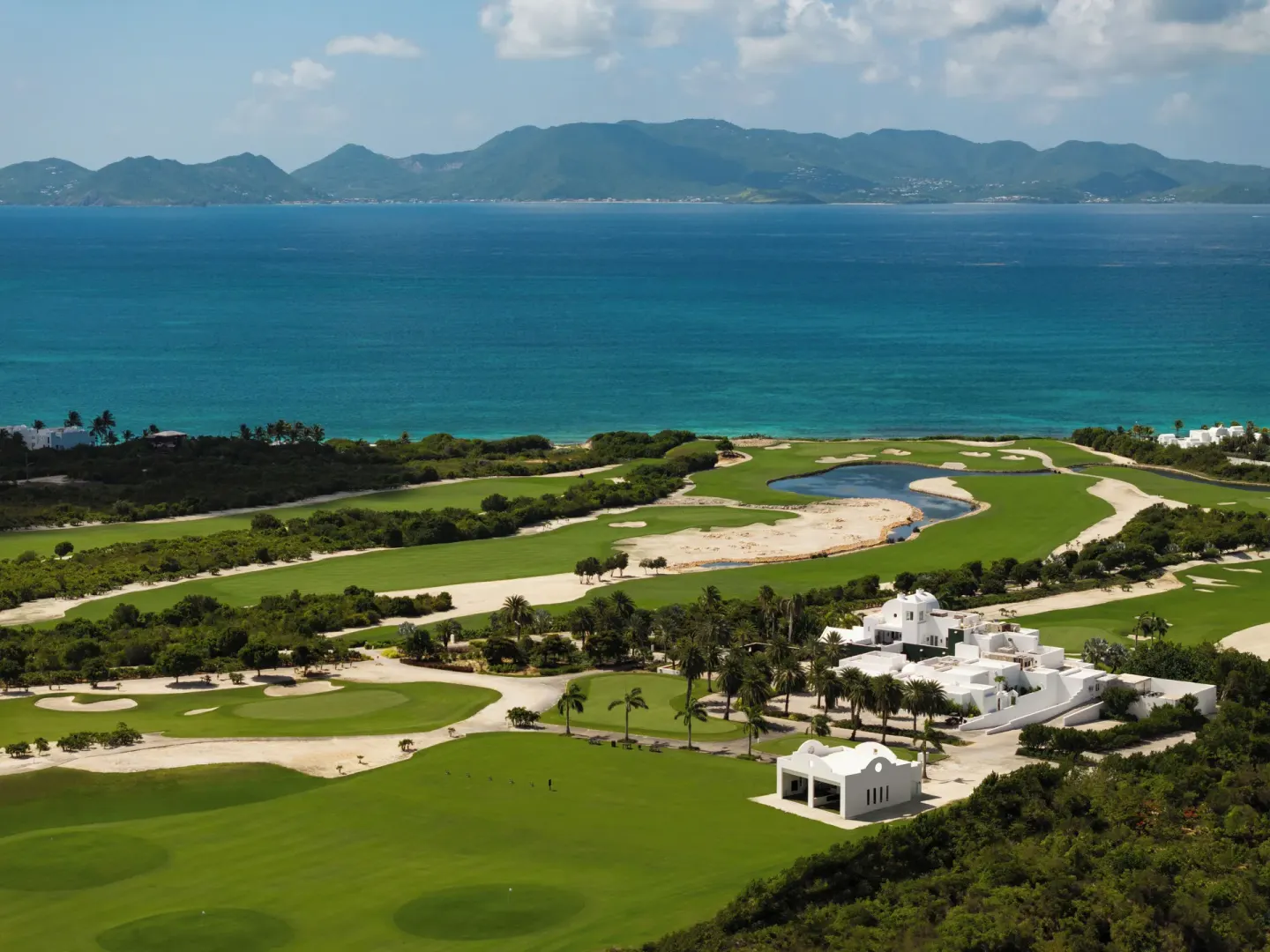 Aerial view of the golf course and Caribbean Sea at Aurora Anguilla Resort & Golf Club.