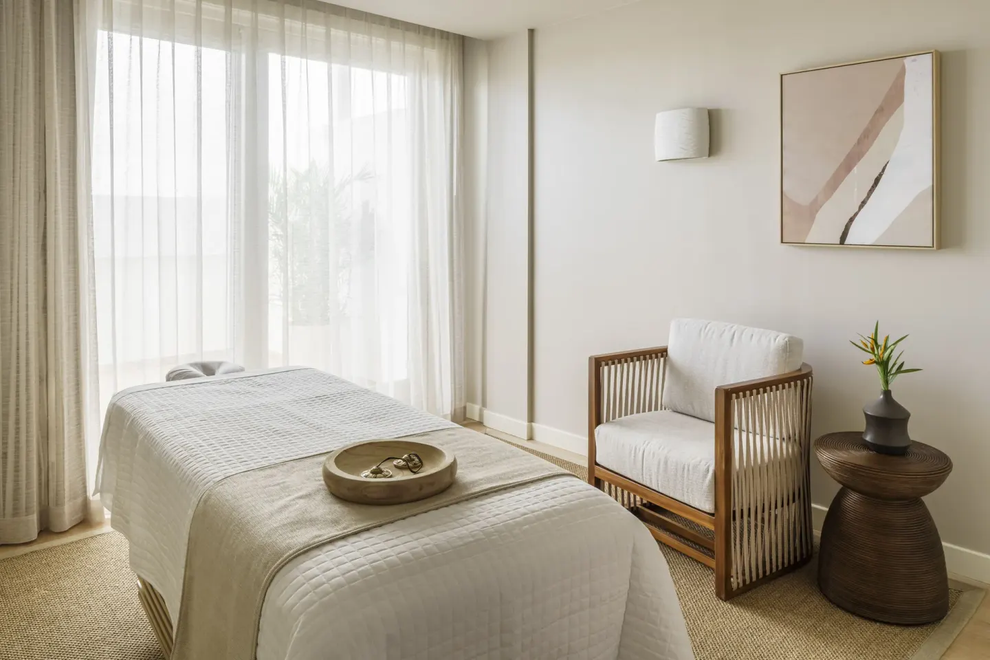 A single spa treatment room with a massage table at Aurora Anguilla Resort & Golf Club.