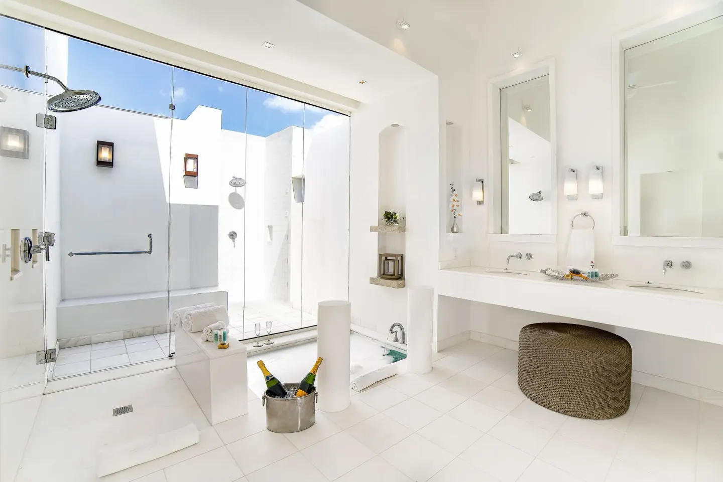 White bathroom in the Five Bedroom Estate Home at Aurora Anguilla Resort & Golf Club.