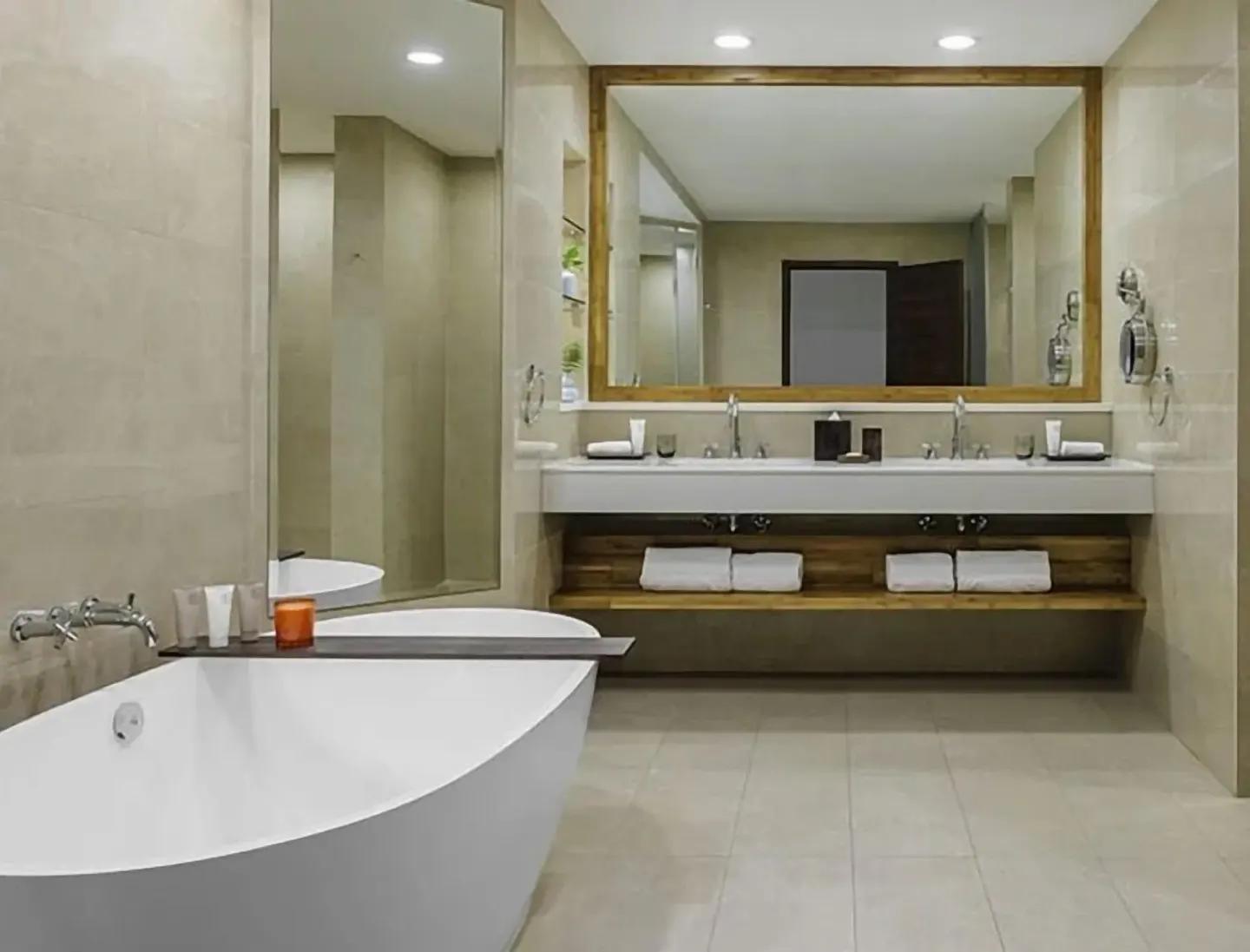Island View Deluxe Room bathroom with soaking tub at Aurora Anguilla Resort & Golf Club.