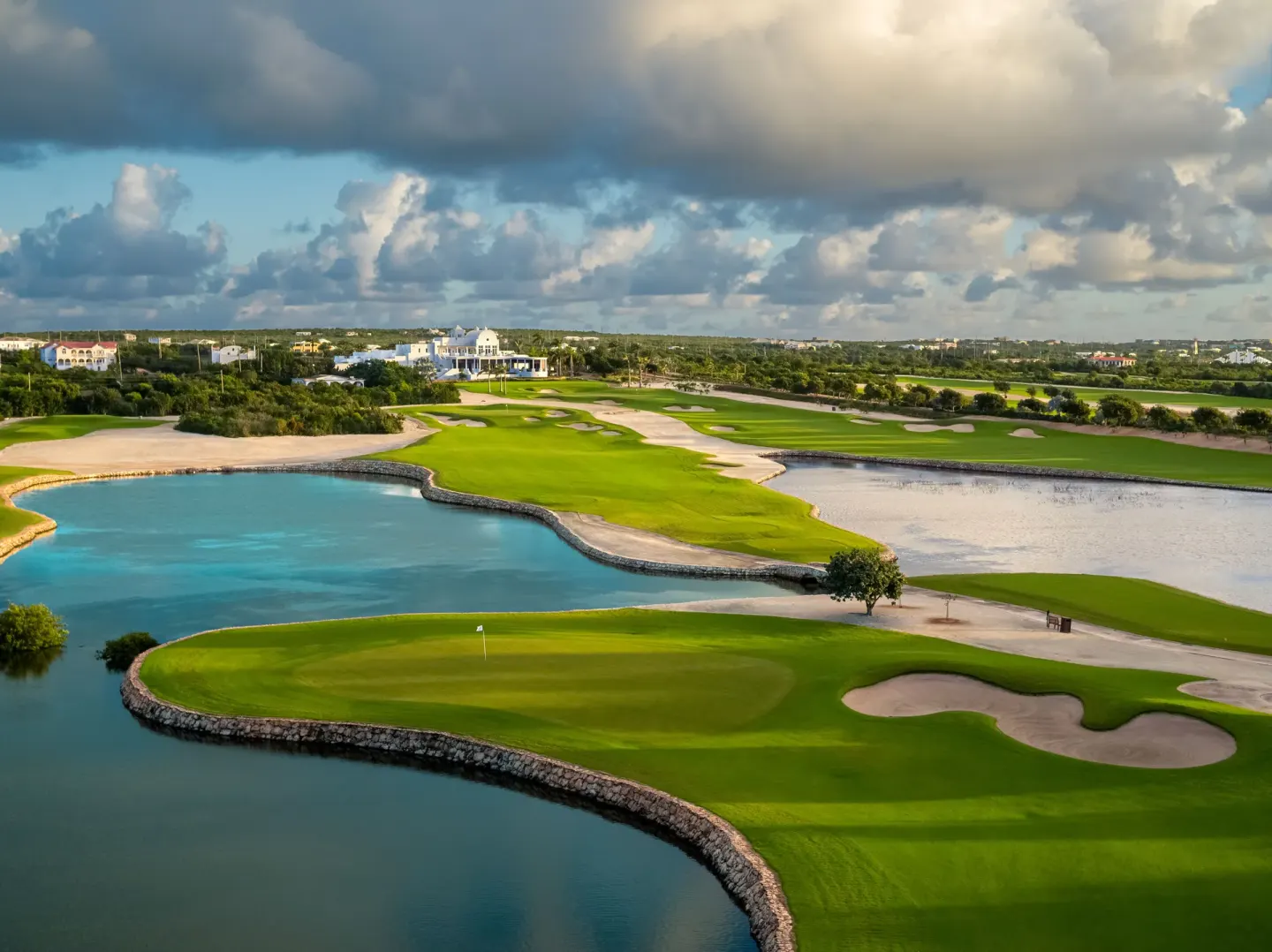 Golf course and lagoon view from Island View Deluxe Room at Aurora Anguilla Resort & Golf Club.