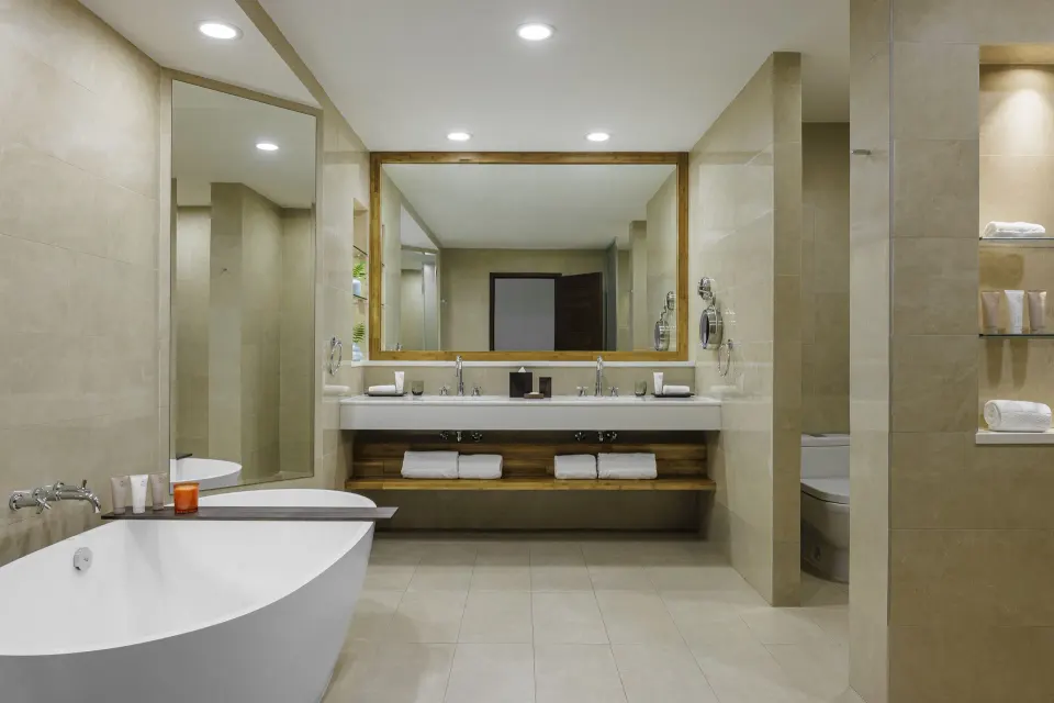 Bathroom in an Ocean View Deluxe Room at Merrywing Tower at Aurora Anguilla Resort & Golf Club.