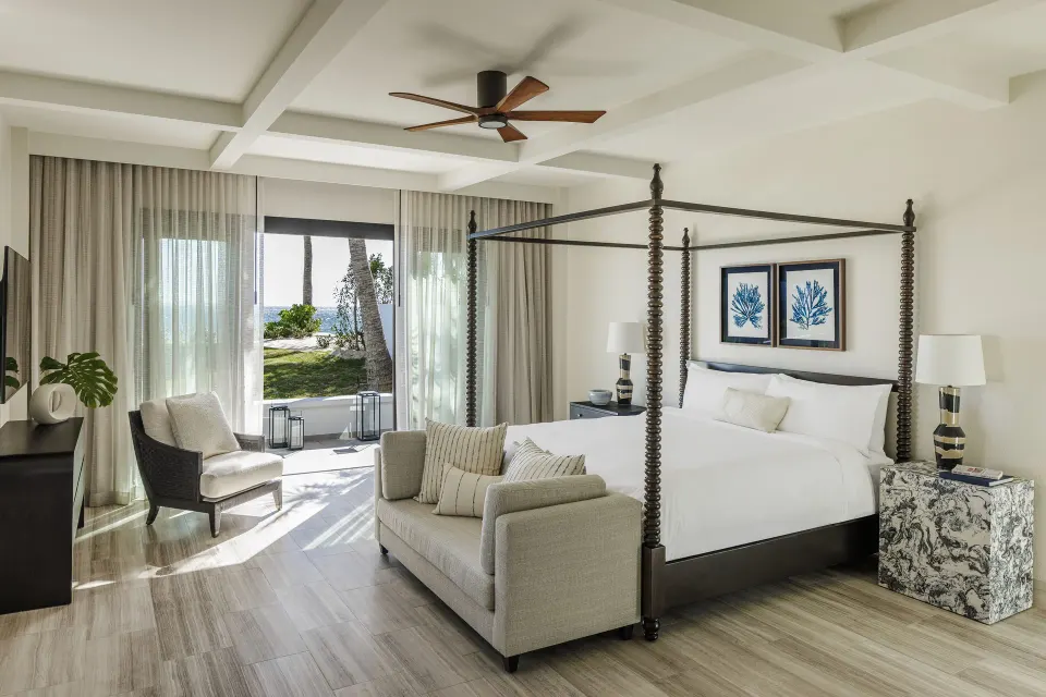 Four-poster king bedroom in the Three Bedroom Beachfront Villa at Aurora Anguilla Resort & Golf Club.