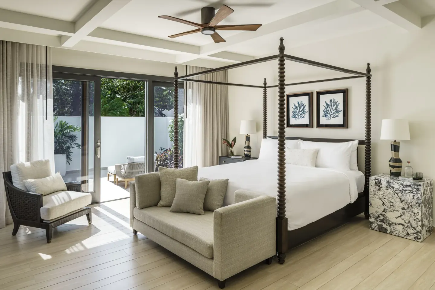 Four-poster king bedroom in a Three Bedroom Garden Villa at Aurora Anguilla Resort & Golf Club.