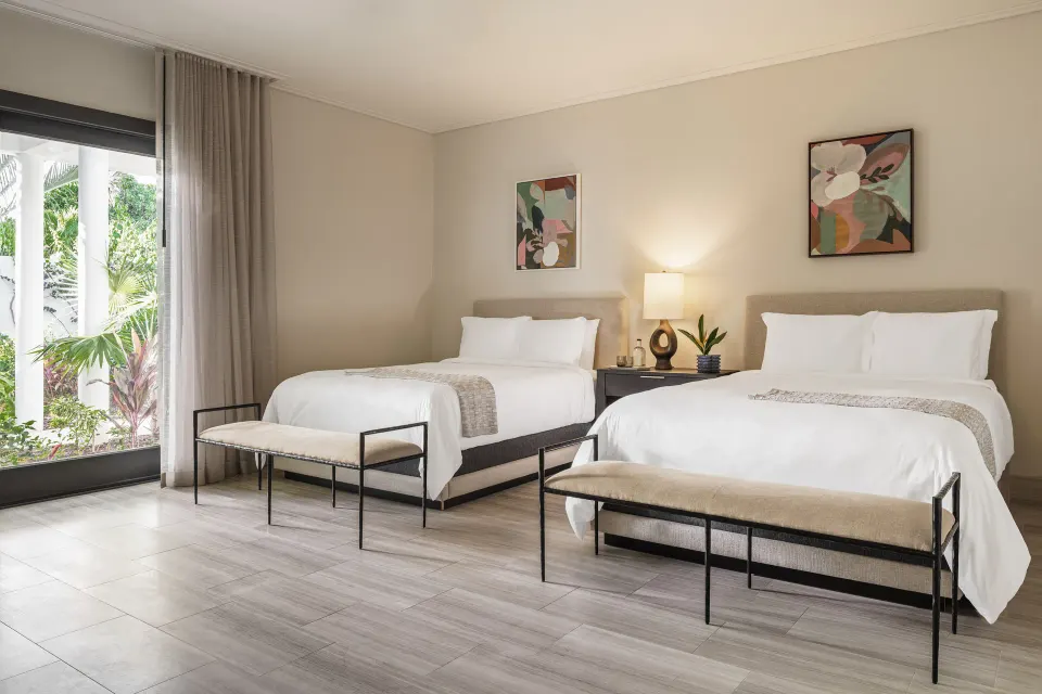 Two-bed guest room in a Three Bedroom Garden Villa at Aurora Anguilla Resort & Golf Club.
