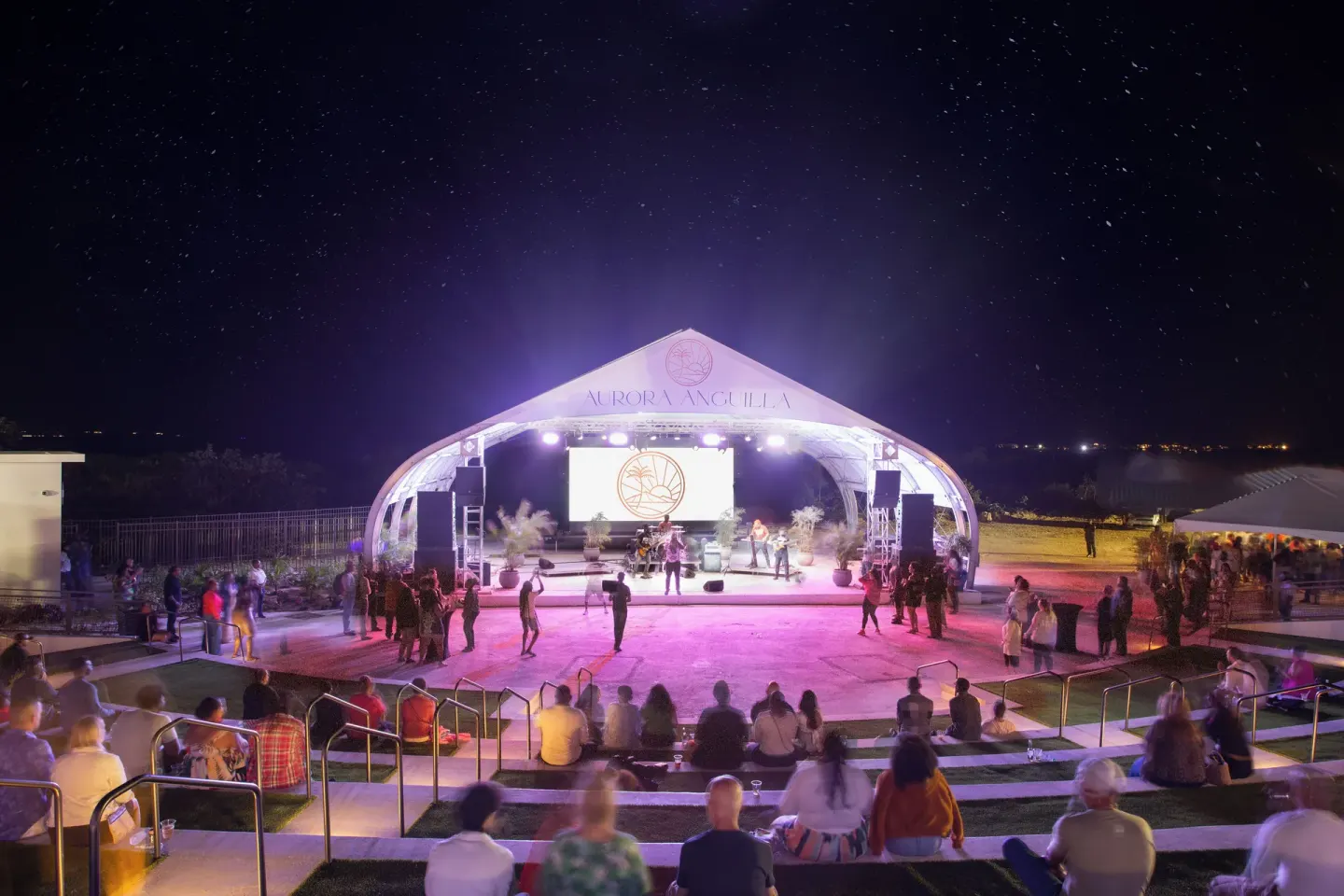Outdoor nighttime concert at the amphitheater at Aurora Anguilla Resort & Golf Club.