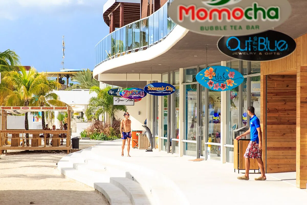 Beachfront shops and walkway near the sand at Avila Beach Hotel.