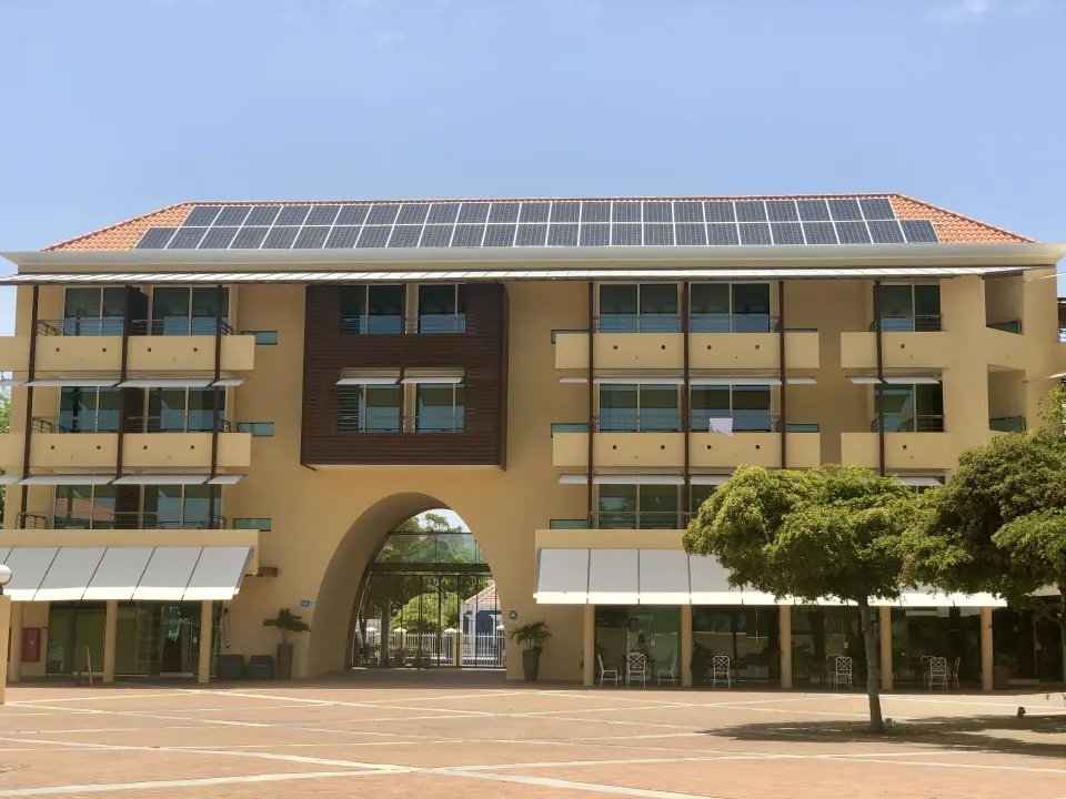 Exterior building with balconies and solar panels at Avila Beach Hotel.