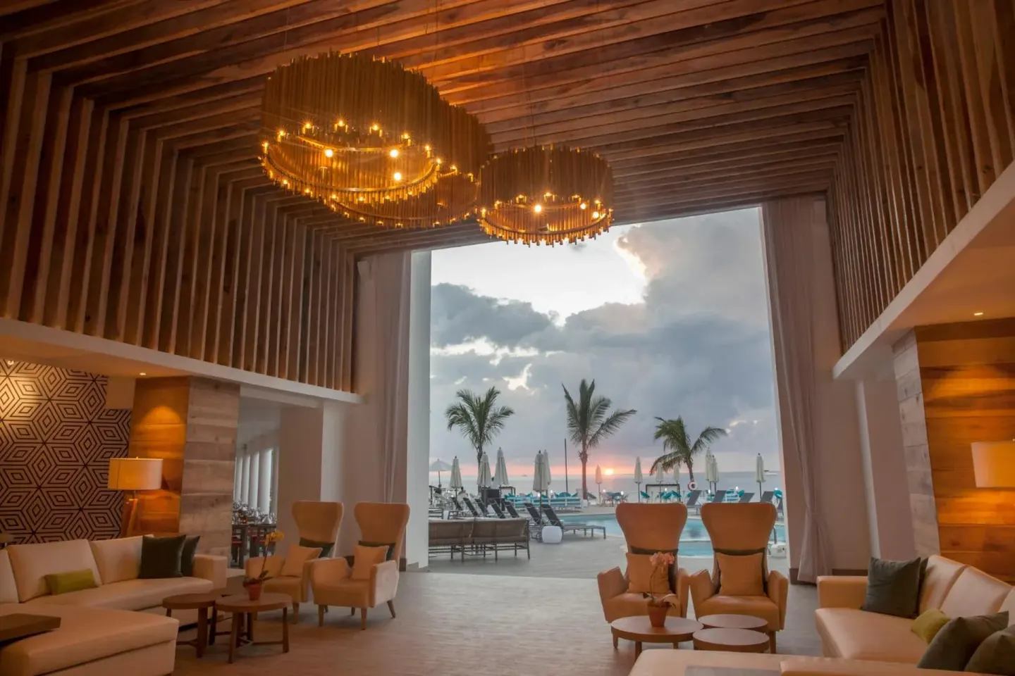Open-air lobby lounge facing the pool and ocean at Azul Beach Resort Negril.