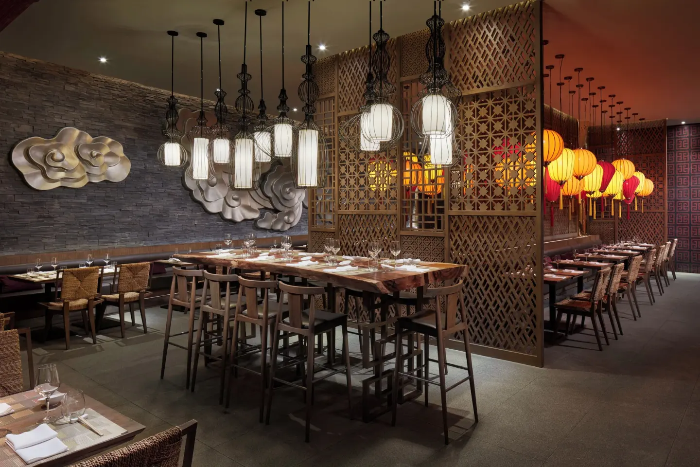 Thai restaurant dining room with lanterns and lattice screens at Azul Beach Resort Negril.