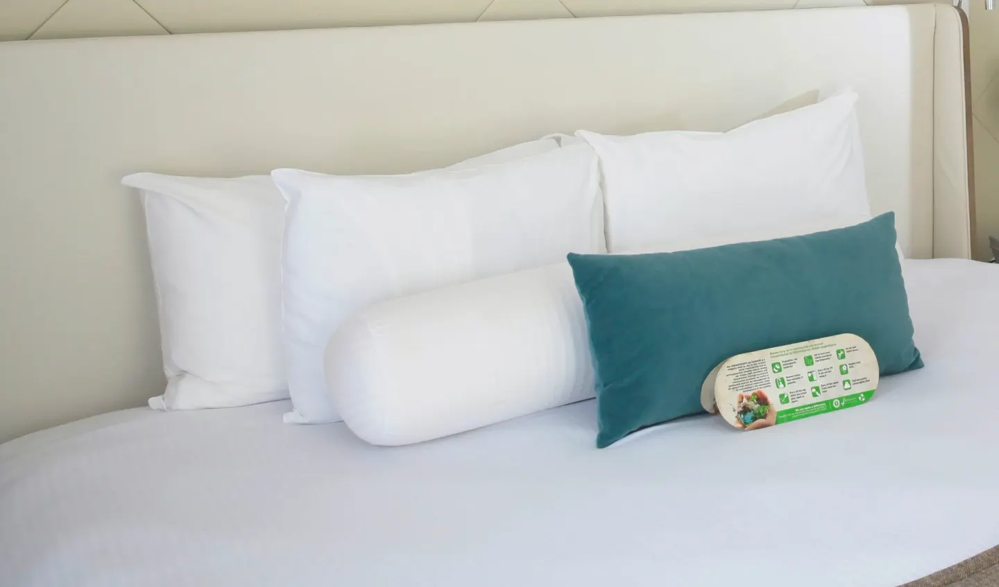 Close-up of the Deluxe Suite bed pillows at Azul Beach Resort Negril.