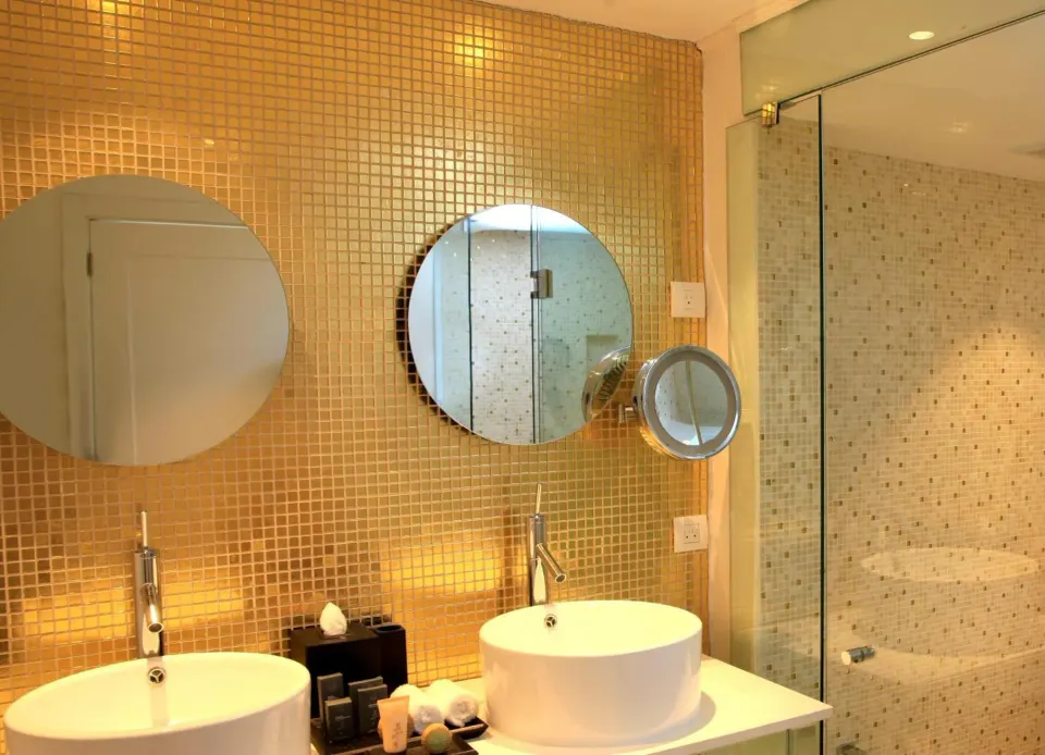 Honeymoon Suite bathroom with twin sinks at Azul Beach Resort Negril.