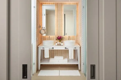 Premium Ocean View Suite bathroom with twin sinks at Azul Beach Resort Negril.