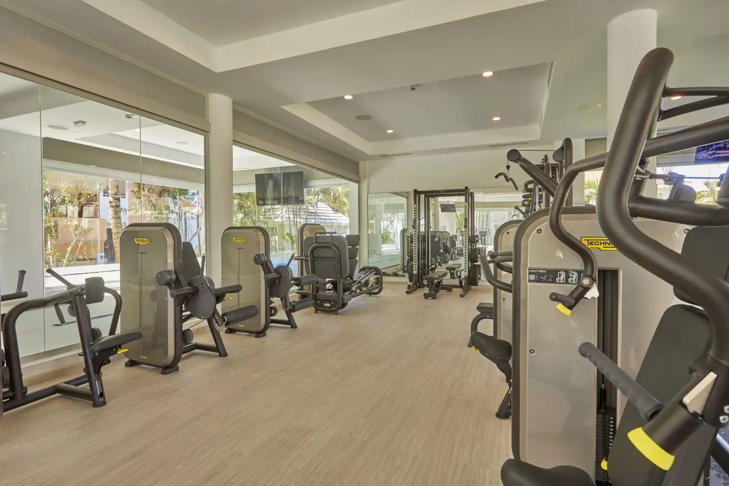 Strength machines lined up inside the gym at Bahia Principe Escape Ambar.