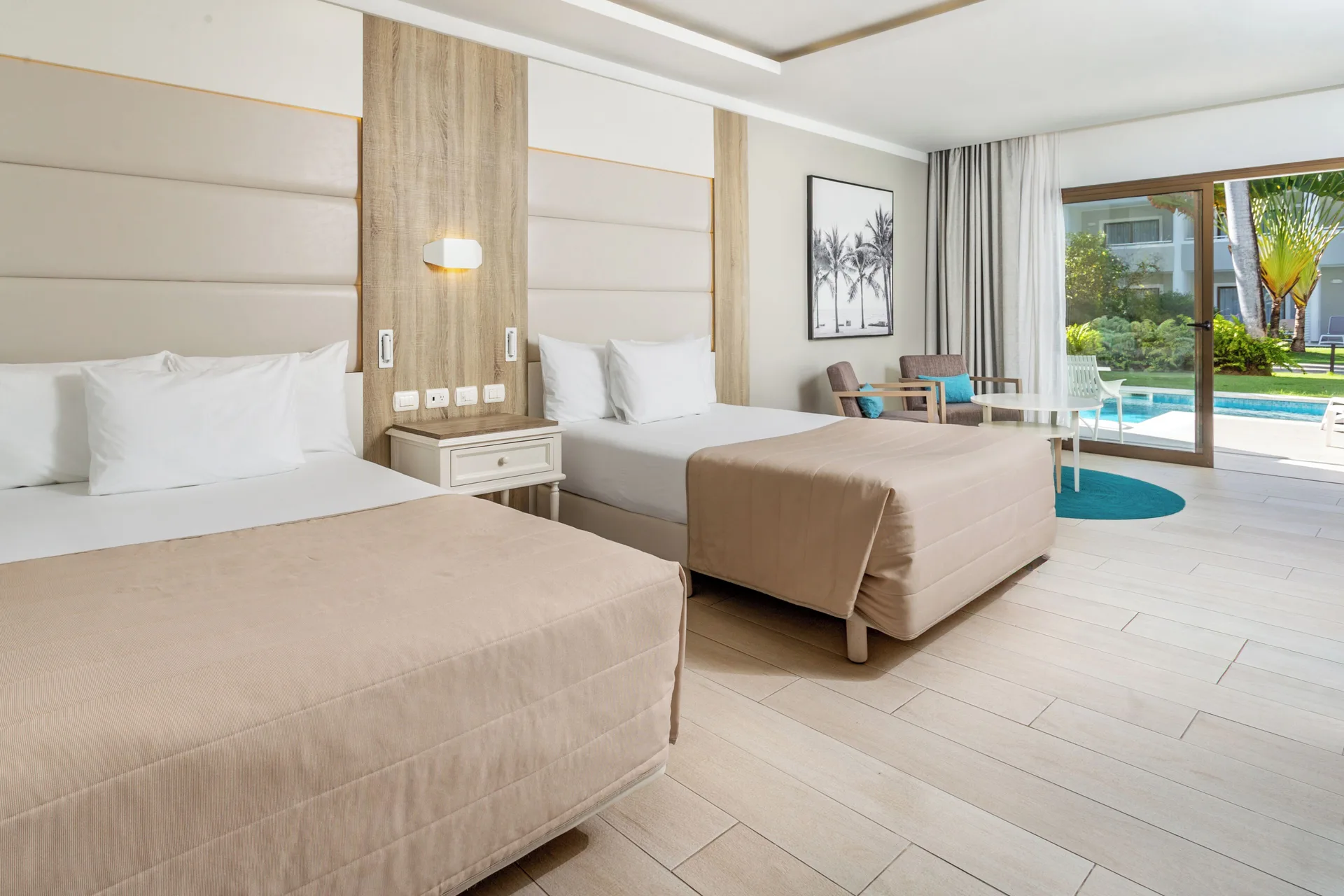 Junior Suite Swim Up with two beds and pool access at Bahia Principe Escape Ambar.