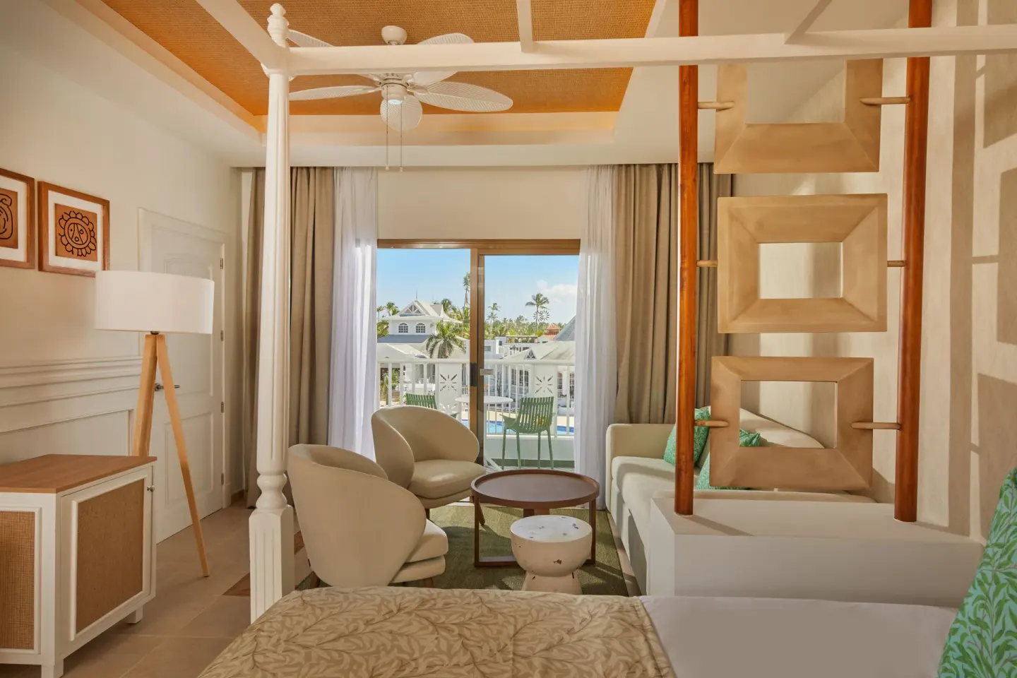 Junior Suite Deluxe with seating area and balcony at Bahia Principe Explore Esmeralda.