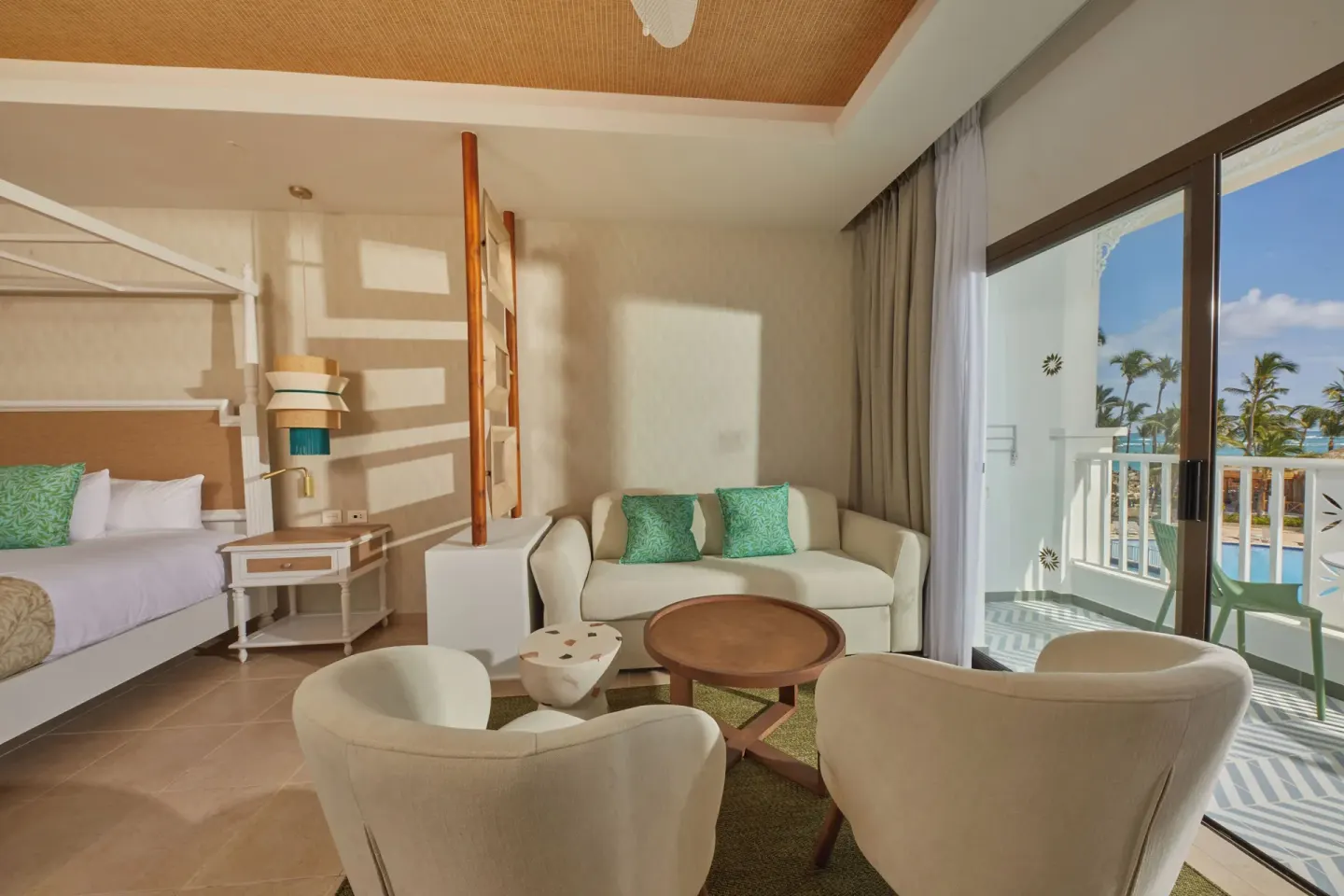Junior Suite Deluxe sitting area beside the balcony at Bahia Principe Explore Esmeralda.