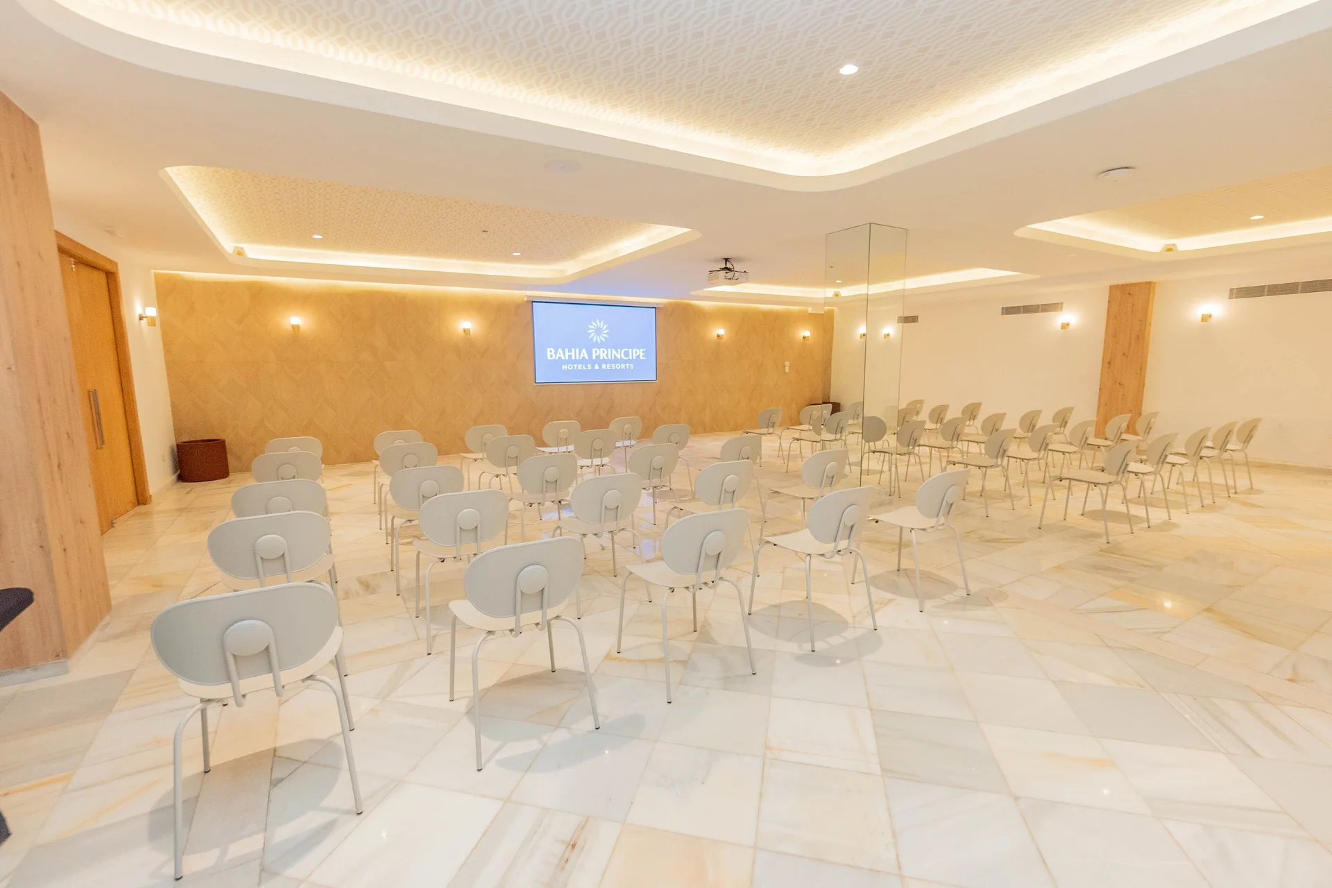 Meeting room set with rows of chairs at Bahia Principe Explore Esmeralda.