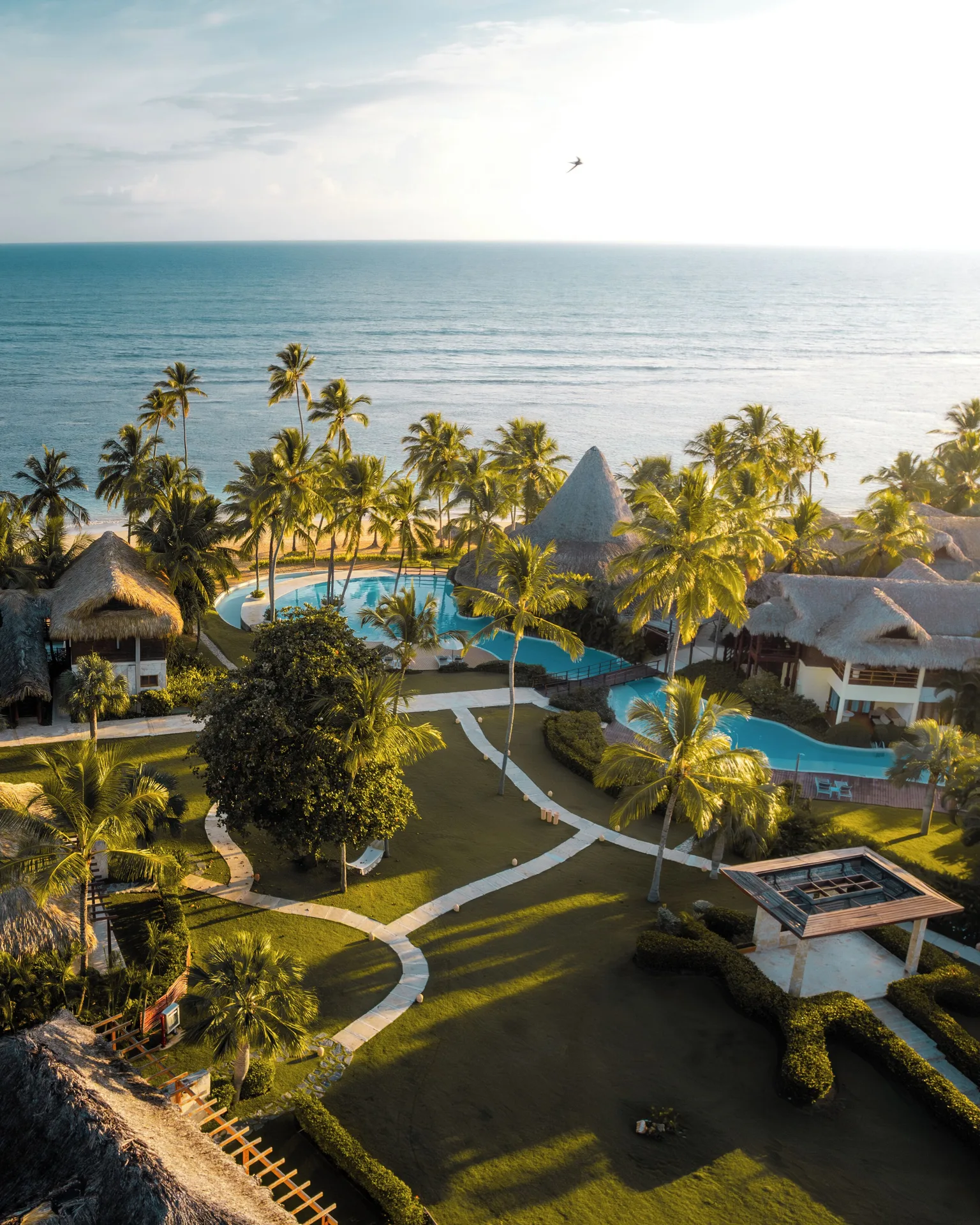 Zoetry Agua Punta Cana boutique all-inclusive resort with thatched suites and tranquil beachfront pools