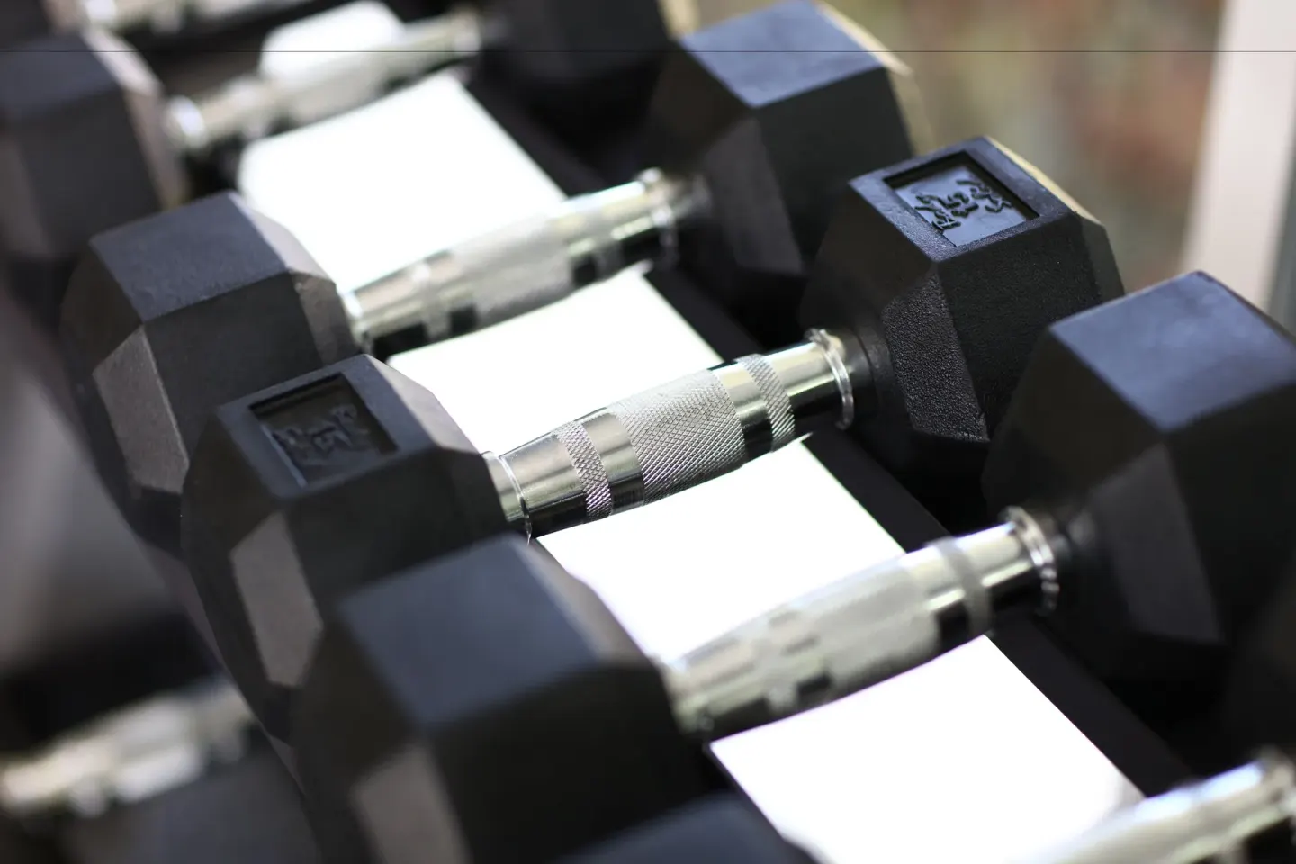 Close-up of dumbbells on a rack at Bahia Principe Grand La Romana.