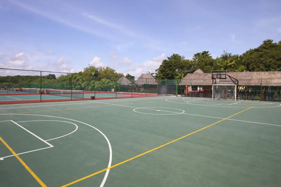 Multi-sport courts with tennis and basketball markings at Bahia Principe Grand Tulum