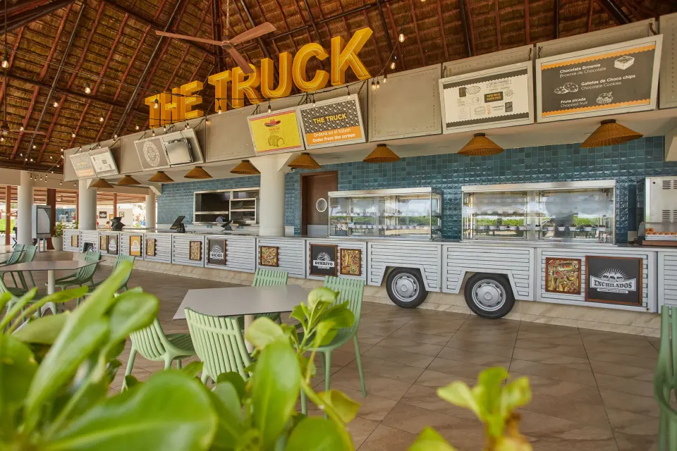 Counter service food-truck station labeled The Truck at Bahia Principe Grand Tulum
