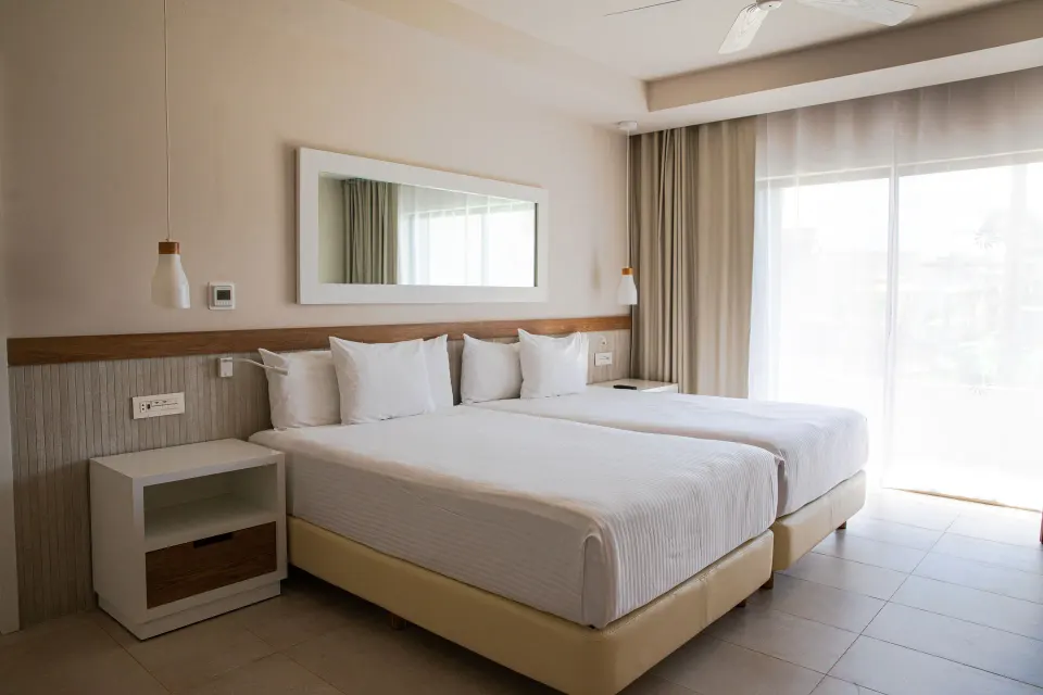 Bedroom with two beds in a 2 Bedroom Suite at Bahia Principe Grand Tulum