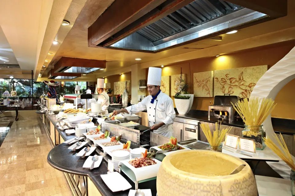Buffet line with chefs preparing food at Bahia Principe Luxury Akumal