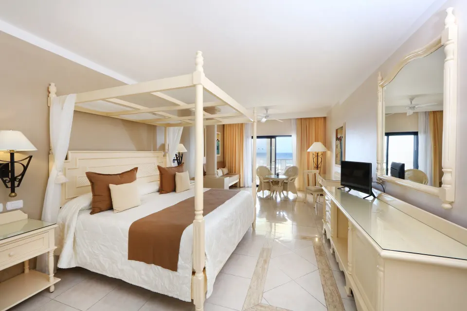 Four-poster Junior Room (Deluxe) with king bed and balcony at Bahia Principe Luxury Akumal