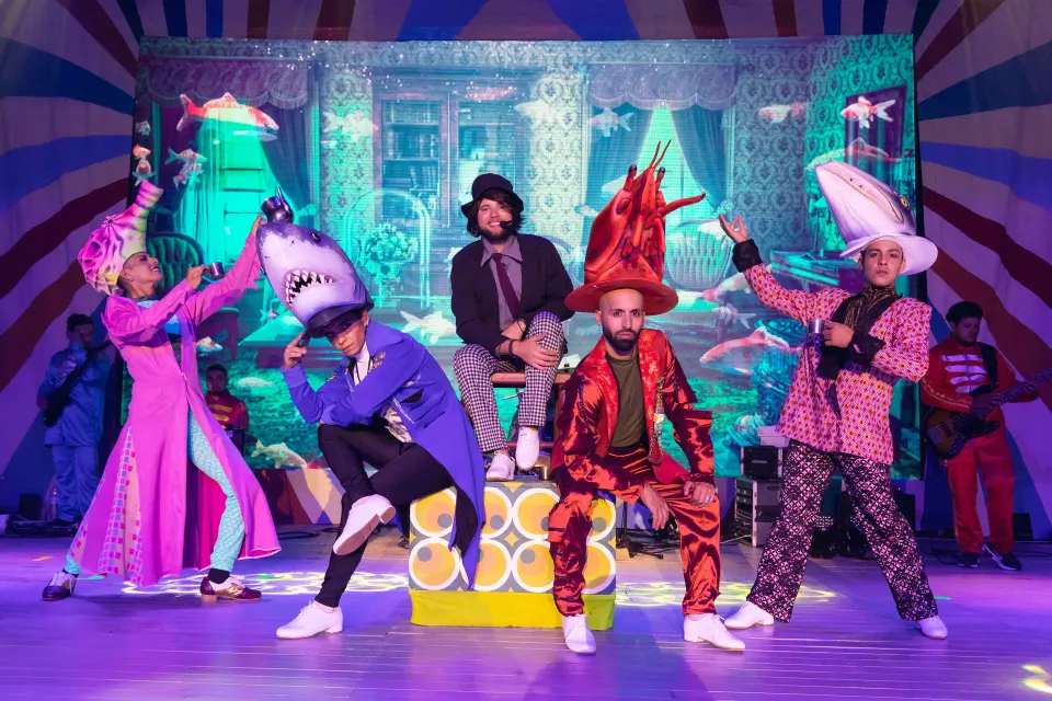 Colorful live performers in costume on stage at Bahia Principe Luxury Akumal