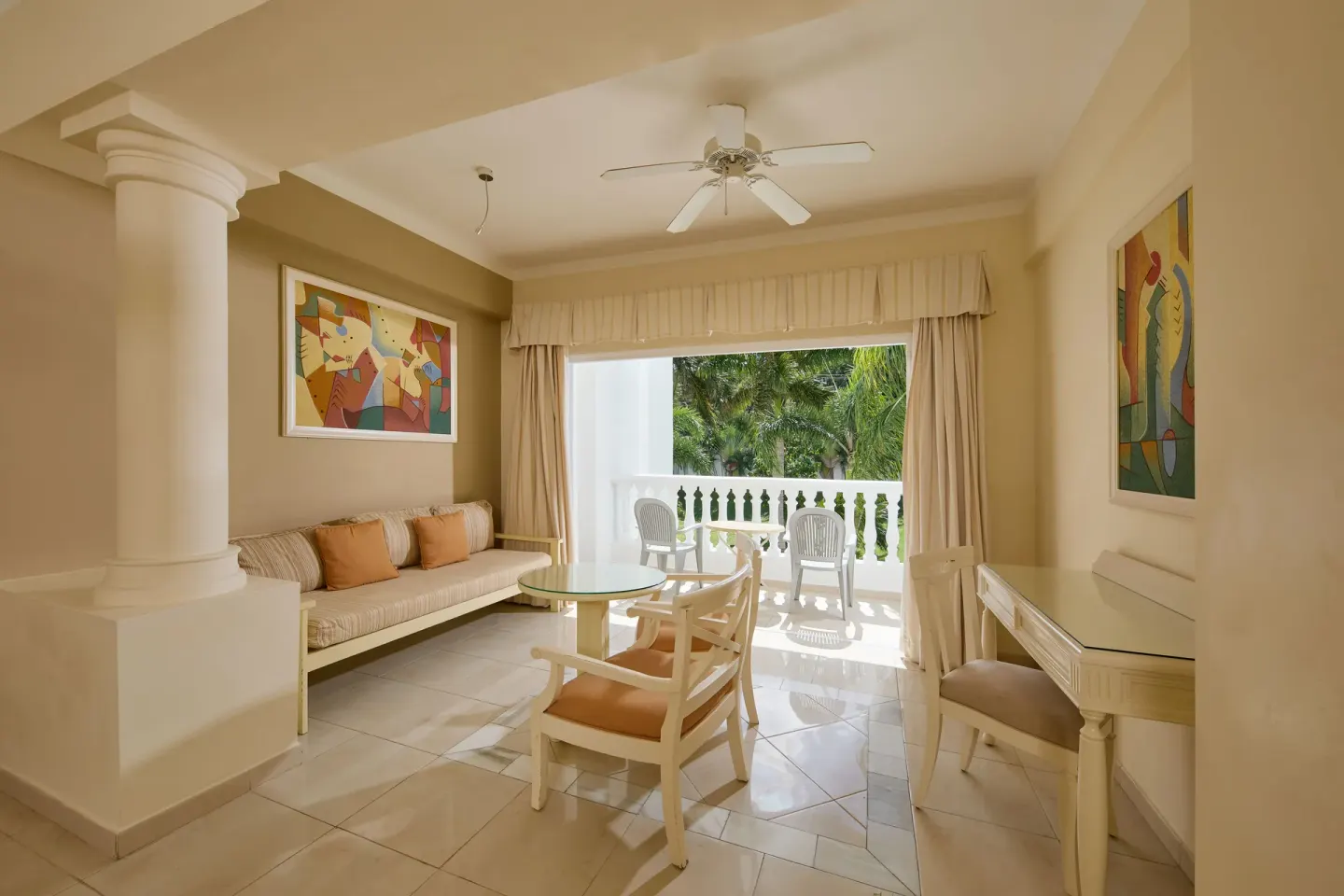 Junior Suite Deluxe sitting area and balcony at Bahia Principe Luxury Runaway Bay.