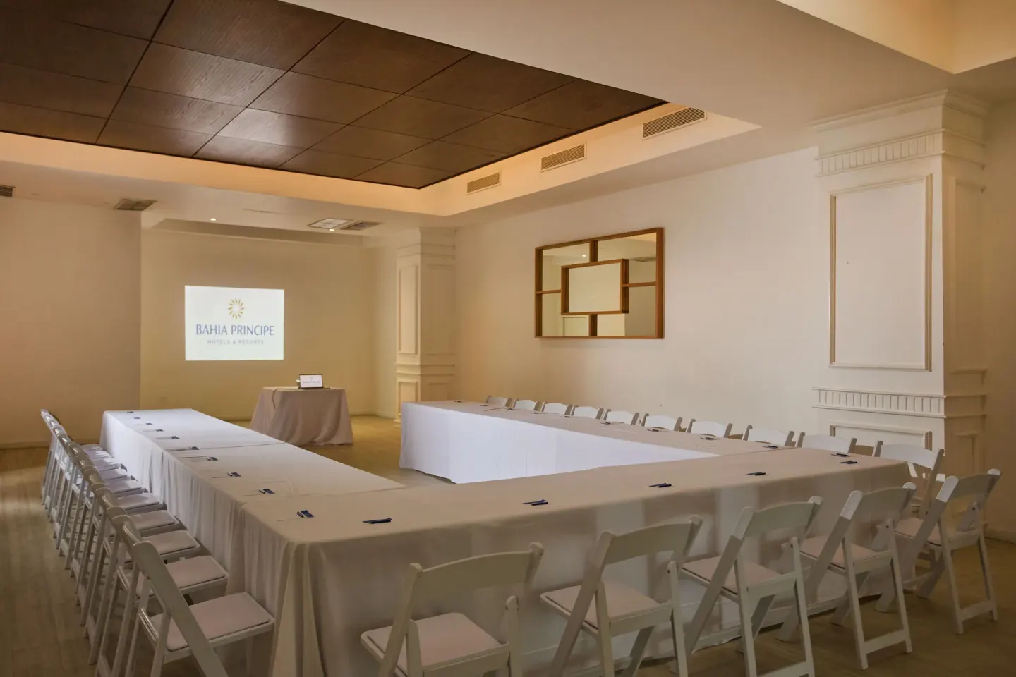 Meeting room with U-shaped tables at Bahia Principe Luxury Runaway Bay.