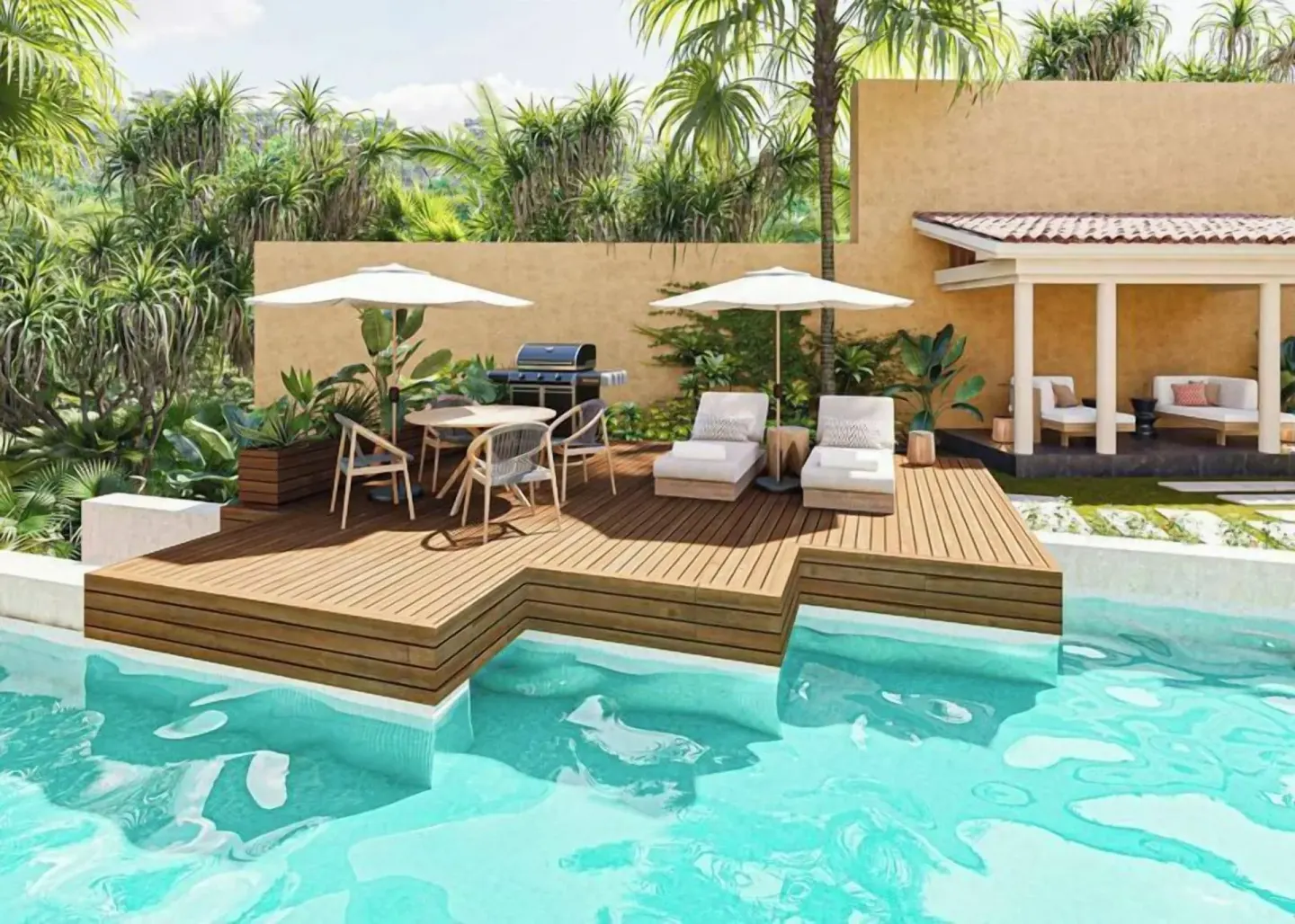 Private pool deck with loungers, umbrellas, and garden seating at Banyan Tree Mayakoba.