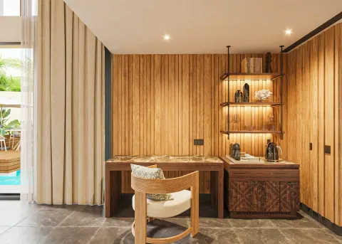 Bliss Pool Villa desk and refreshment area with pool view at Banyan Tree Mayakoba.