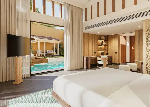 Bliss Pool Villa king bed facing the private pool terrace at Banyan Tree Mayakoba.