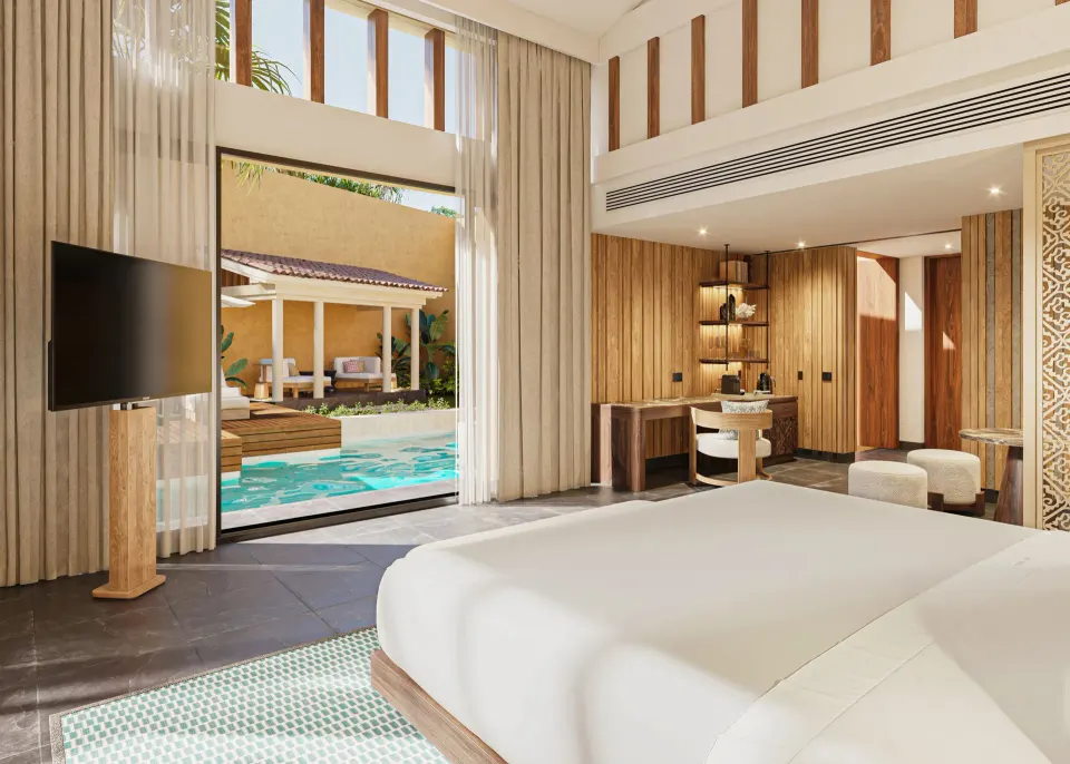 Bliss Pool Villa king bed facing the private pool terrace at Banyan Tree Mayakoba.