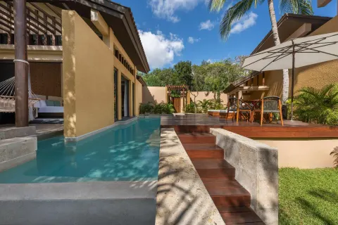 Bliss Pool Villa terrace with pool, hammock and dining deck at Banyan Tree Mayakoba.