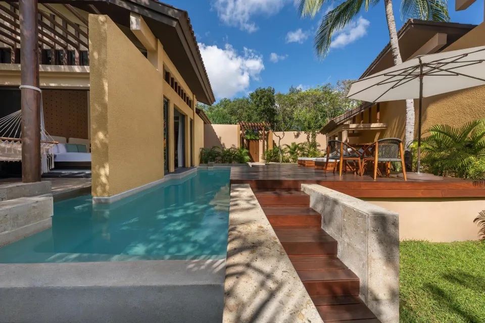 Bliss Pool Villa terrace with pool, hammock and dining deck at Banyan Tree Mayakoba.
