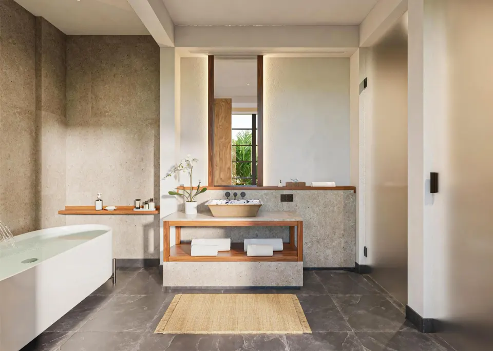 Bathroom with soaking tub in the Harmony Two-Bedroom Lagoon Pool Villa at Banyan Tree Mayakoba.