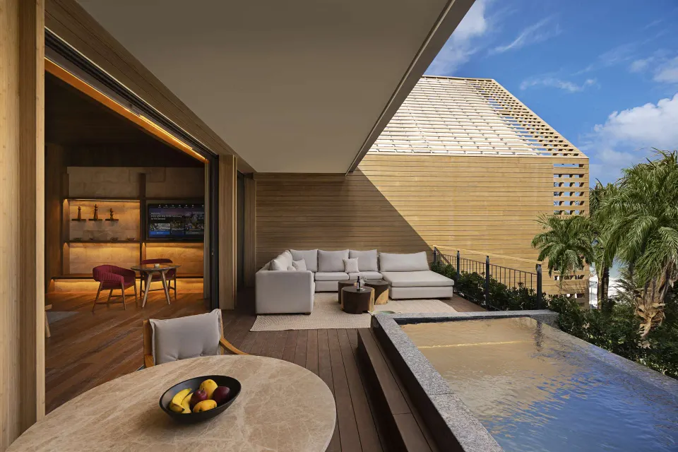 Oceanfront Veranda Pool Suite terrace with plunge pool and lounge seating at Banyan Tree Mayakoba.