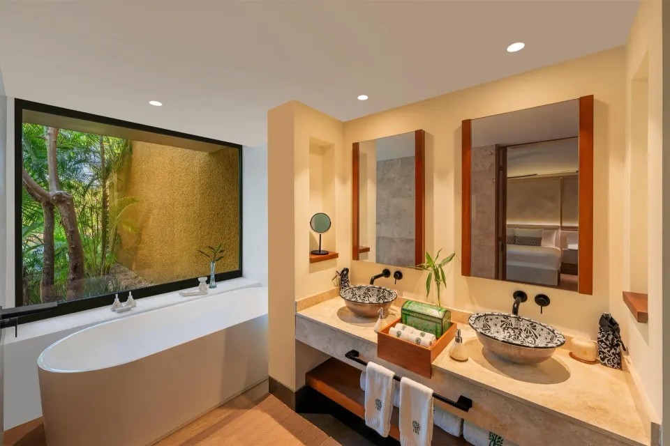 Bathroom vanity and tub in a Three-Bedroom Family Residence at Banyan Tree Mayakoba.