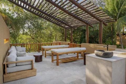 Wellbeing Sanctuary Pool Villa rooftop terrace with loungers at Banyan Tree Mayakoba.