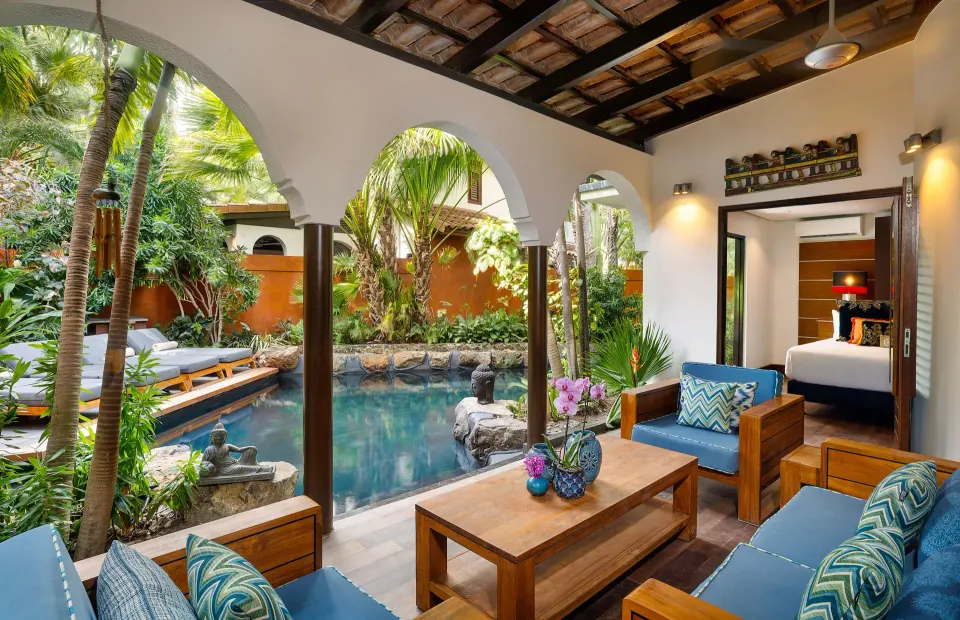 Covered private lounge opening onto a plunge pool at Baoase Luxury Resort