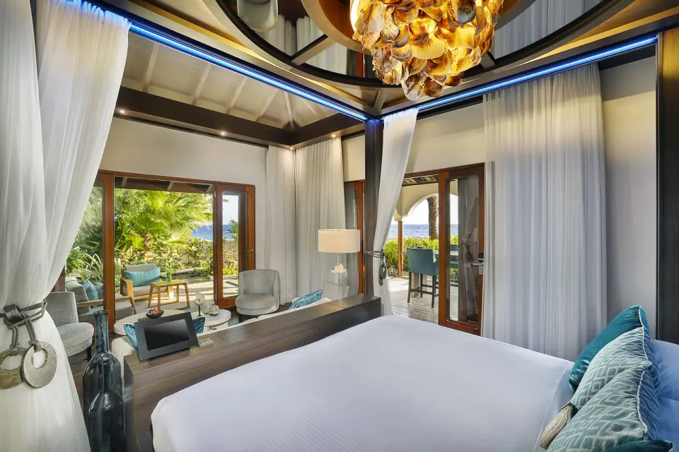 Canopy king bed and terrace view in a Private Pool Beachfront Suite at Baoase Luxury Resort