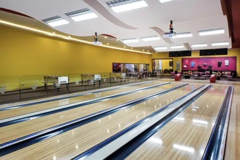 A polished bowling alley with multiple lanes at Barceló Bávaro Beach.