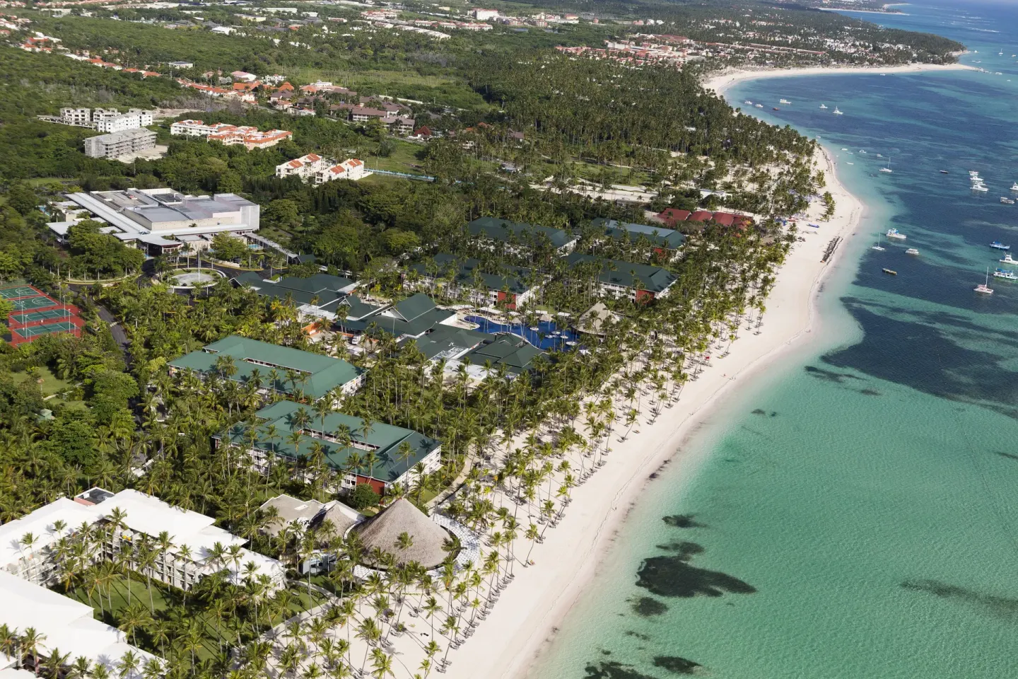 Wide aerial view of the coastline and resort grounds at Barceló Bávaro Beach.