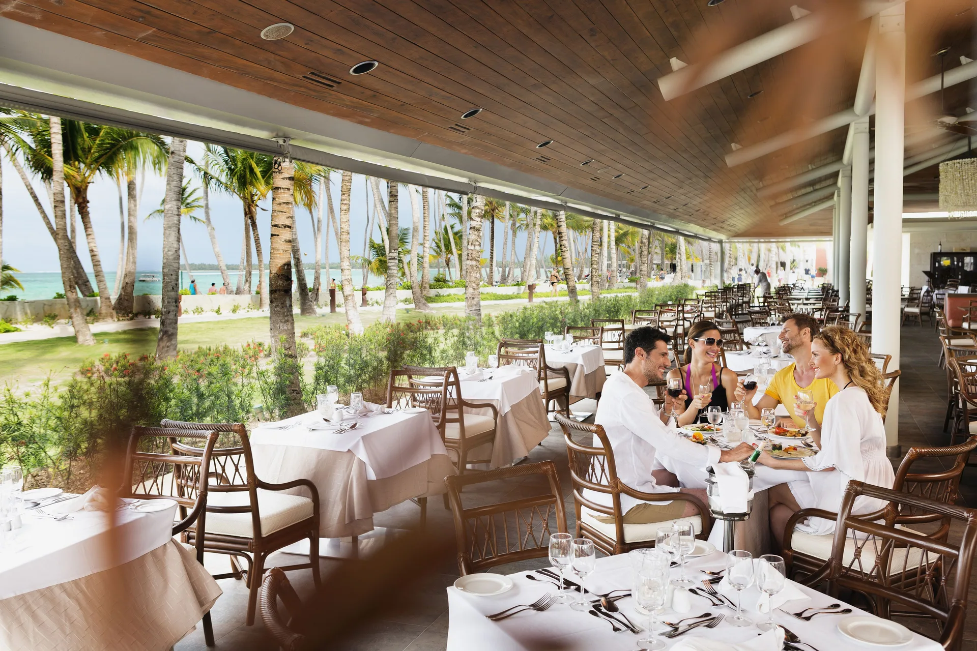 Open-air beachfront restaurant seating at Barceló Bávaro Beach.