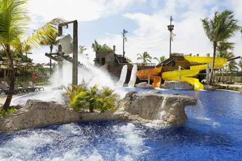Water sprays and colorful slides fill the splash pool at Barceló Bávaro Palace.